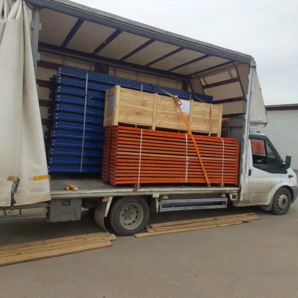 a truck with a load of wood